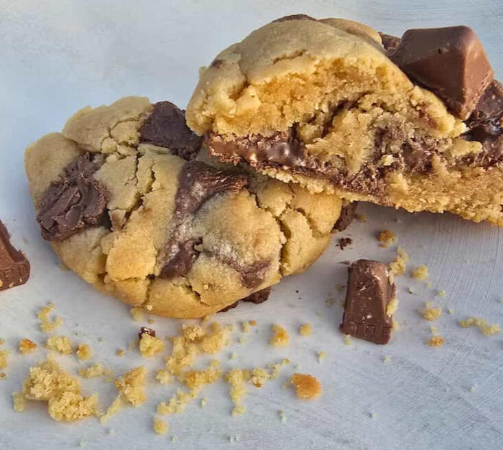 The mountainous Swiss Peak Loaded Cookie features Swiss milk chocolate and honey-almond nougat pieces - an ultimate Toblerone experience - Crumbology handmade fresh in Mandurah & Peel region WA